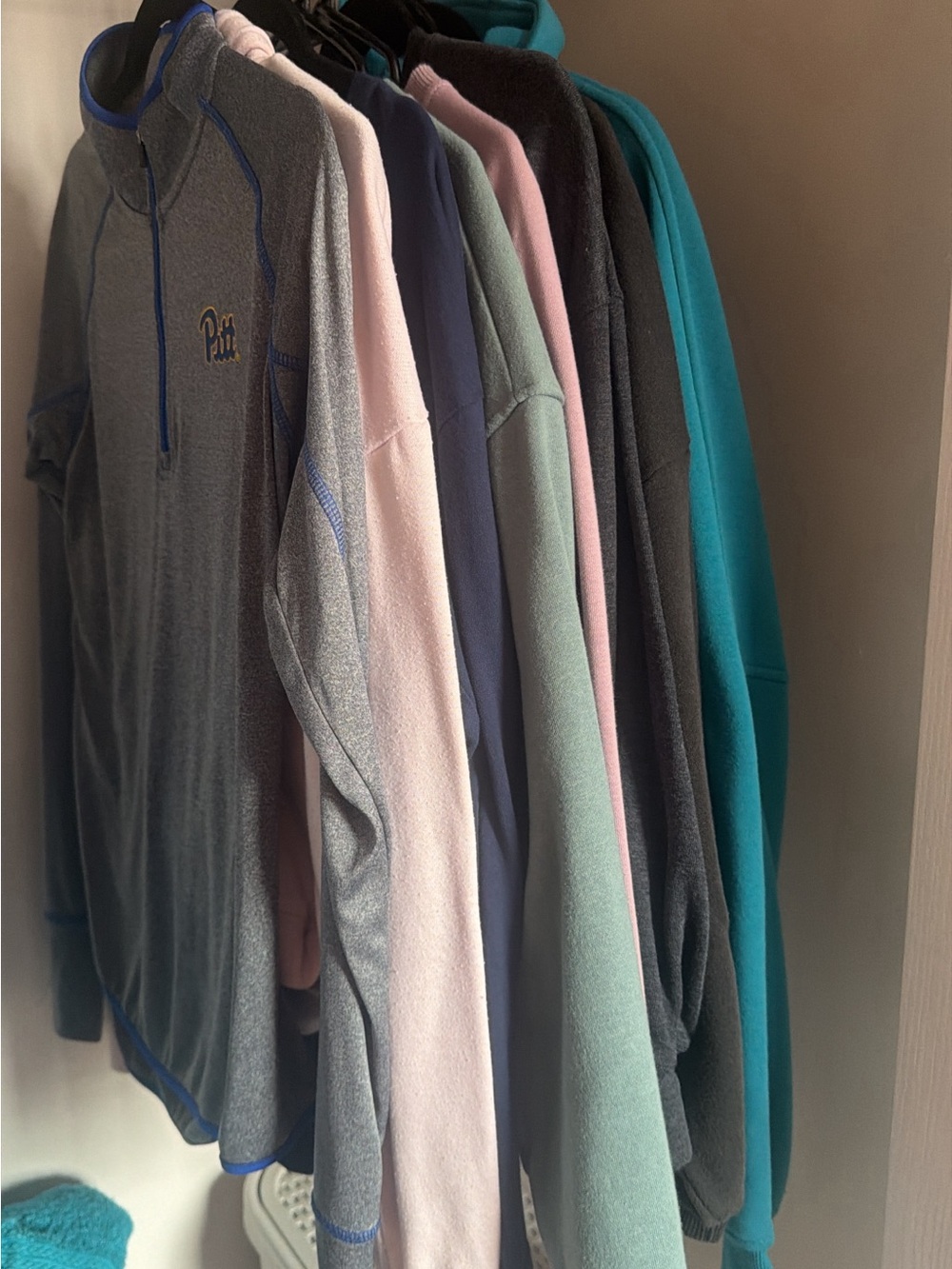 Multiple long sleeve shirts